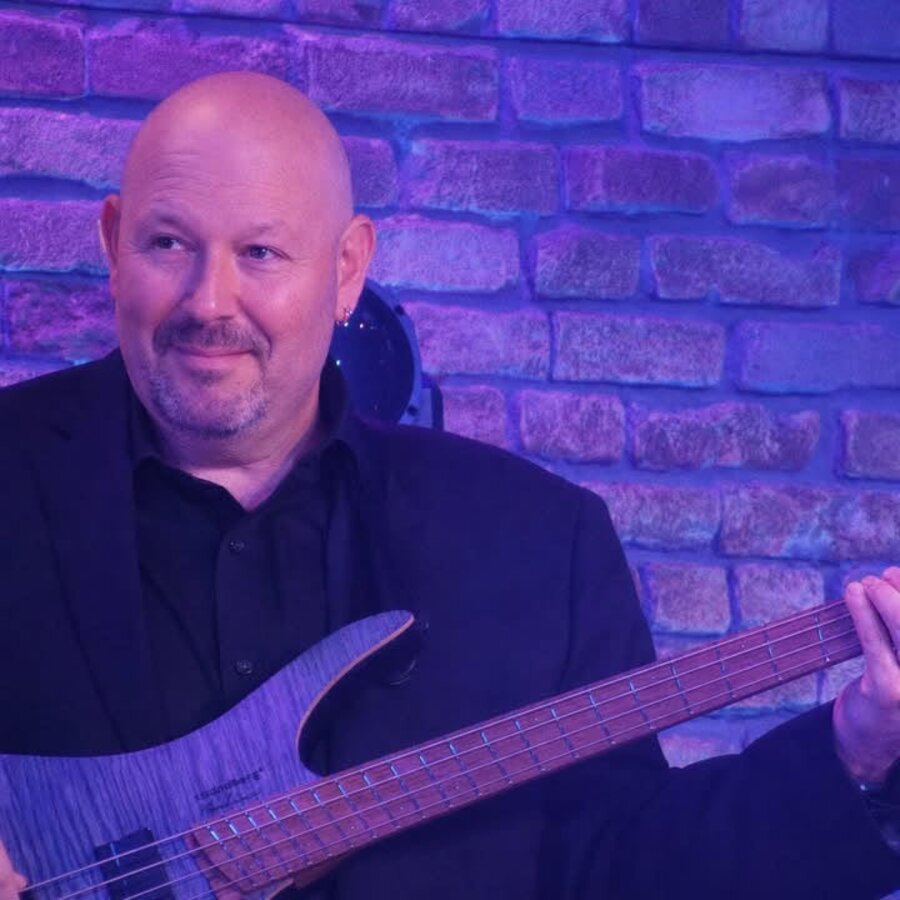Dave Lobenstein performing live on bass guitar for What the World Needs Now